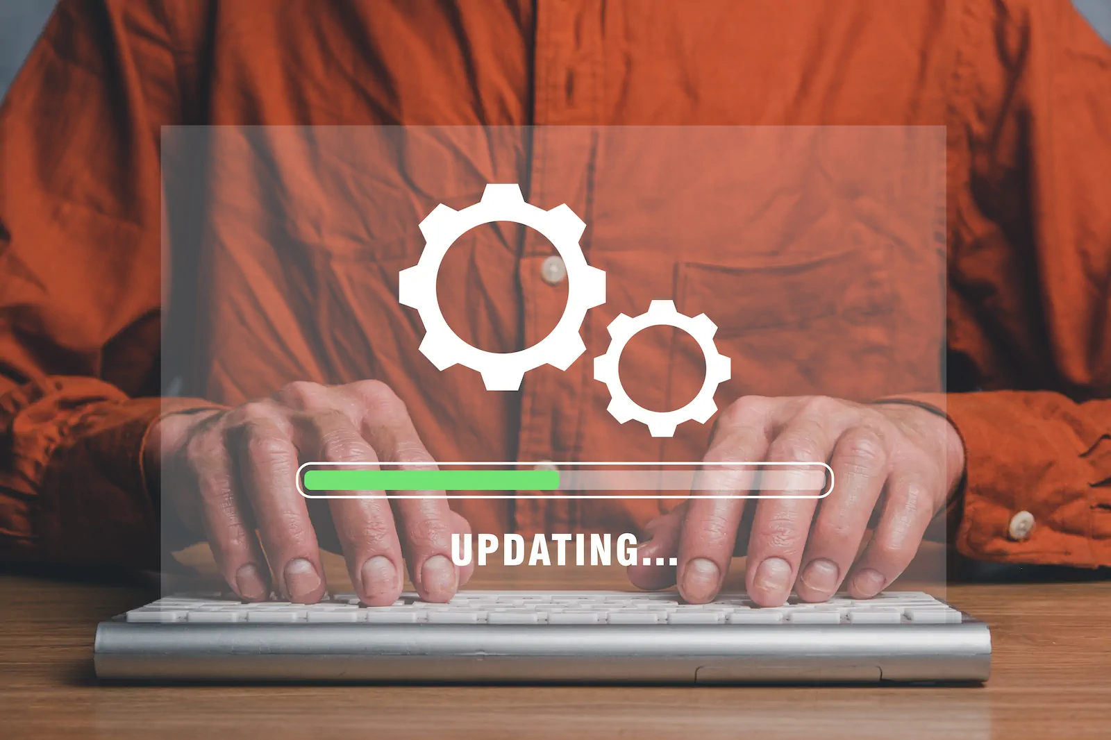 Screen showing an update process with gears and a progress bar.