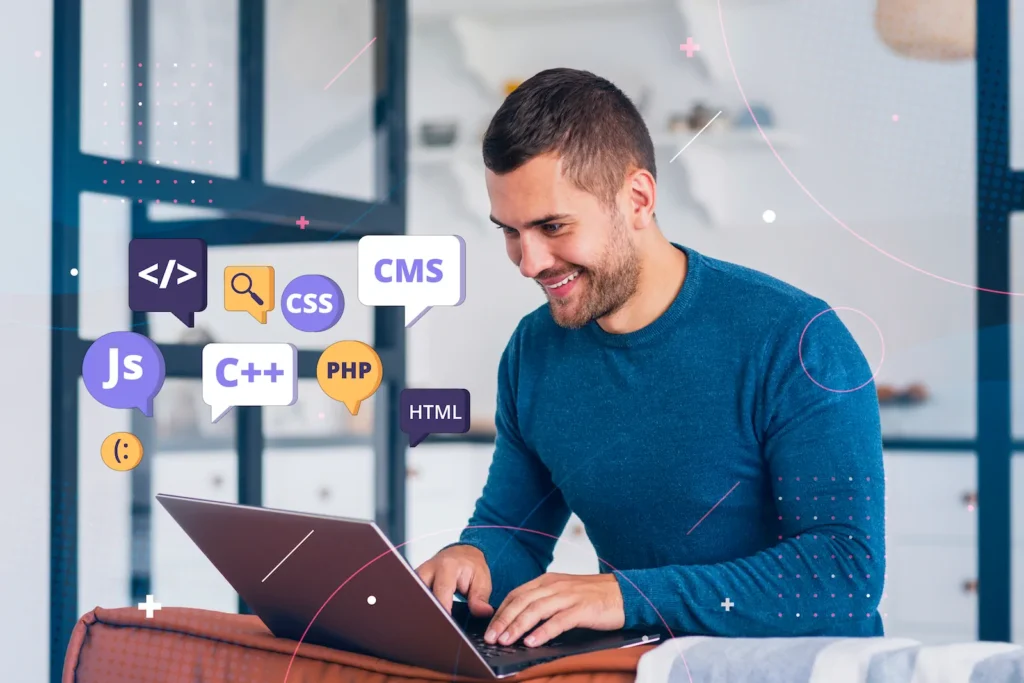Developer smiling while coding with programming languages and CMS.